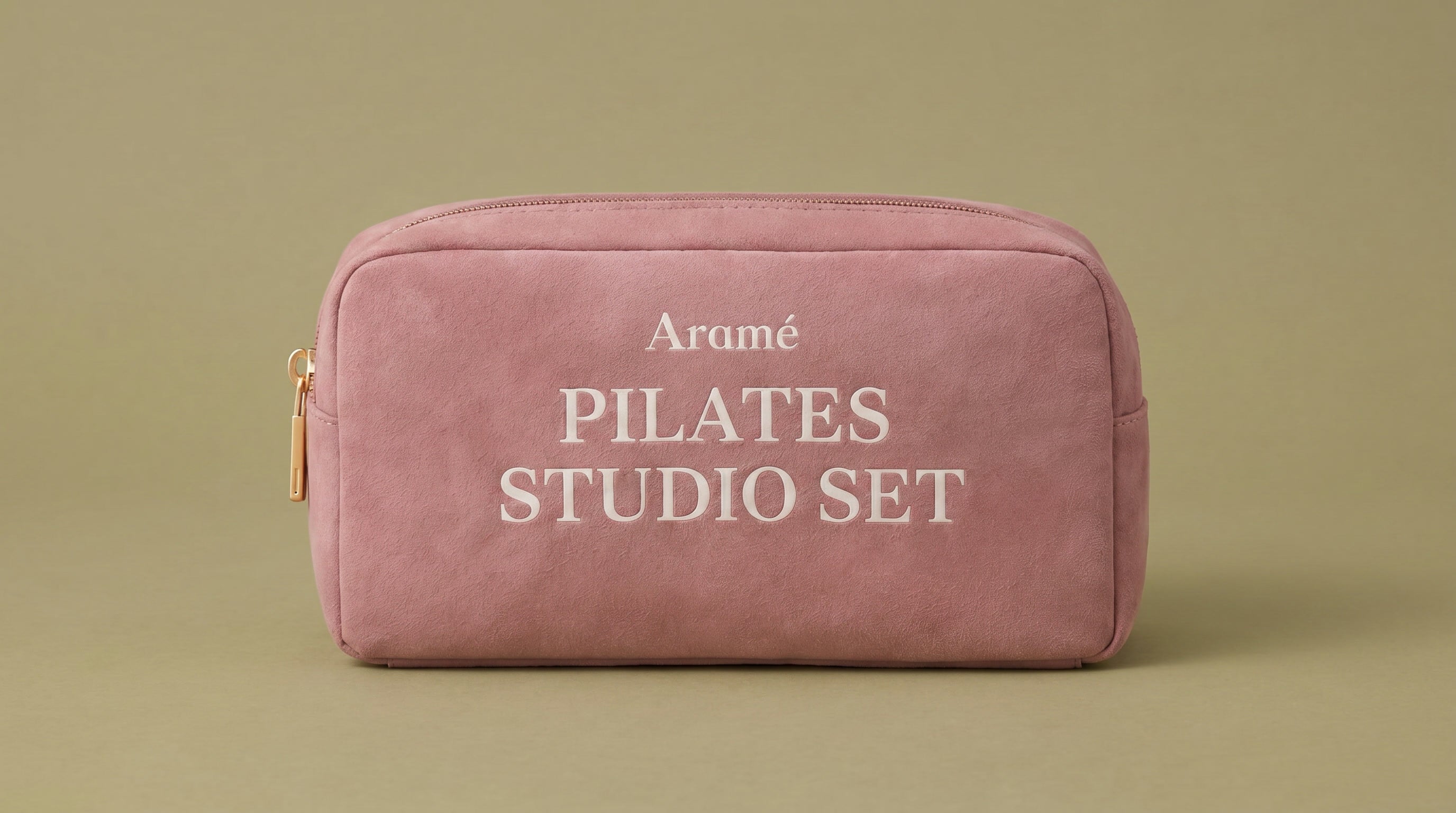 Aramé Studio Set in Dusty Pink with gold zipper hardware and Pilates grip socks