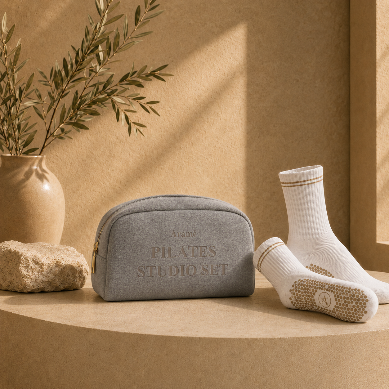 Soft Stone Aramé Studio Set with suede-texture studio bag and Pilates grip socks