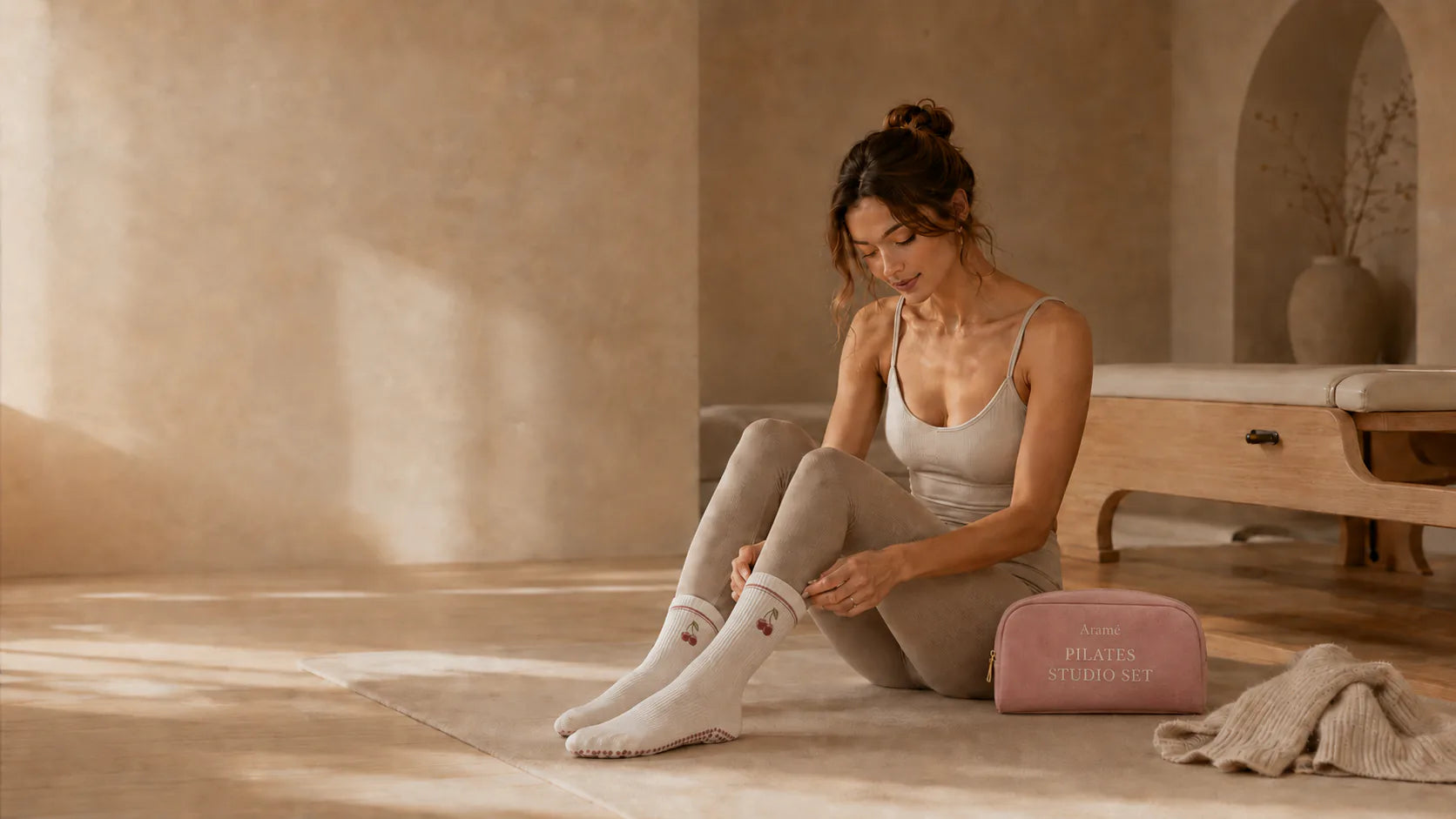 Aramé dusty pink studio bag with Aramé ribbed grip socks before class