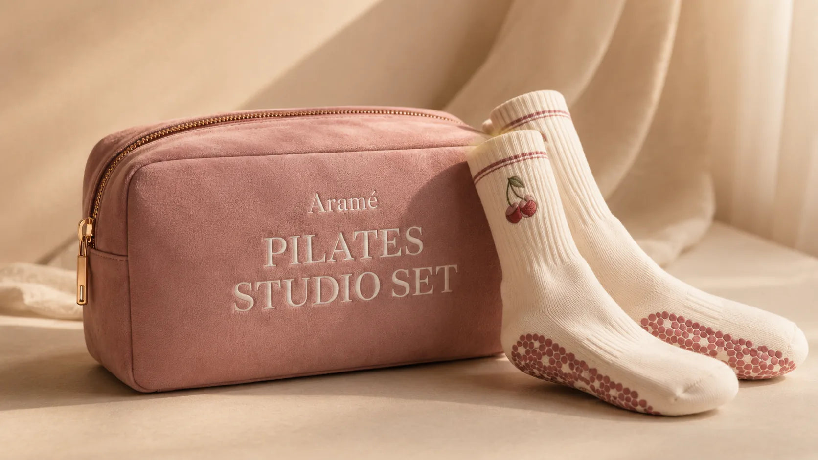 Aramé Studio Set craft detail with suede-texture finish and gold zipper hardware