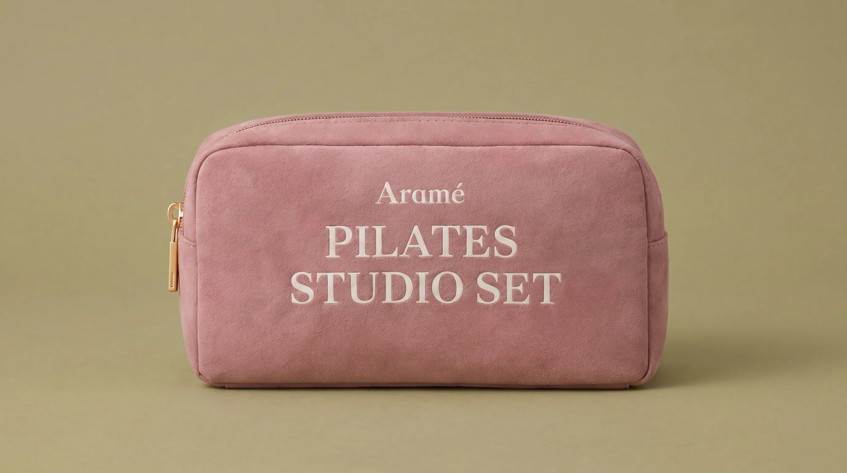 Aramé Studio Set in Dusty Pink with gold zipper hardware and Pilates grip socks